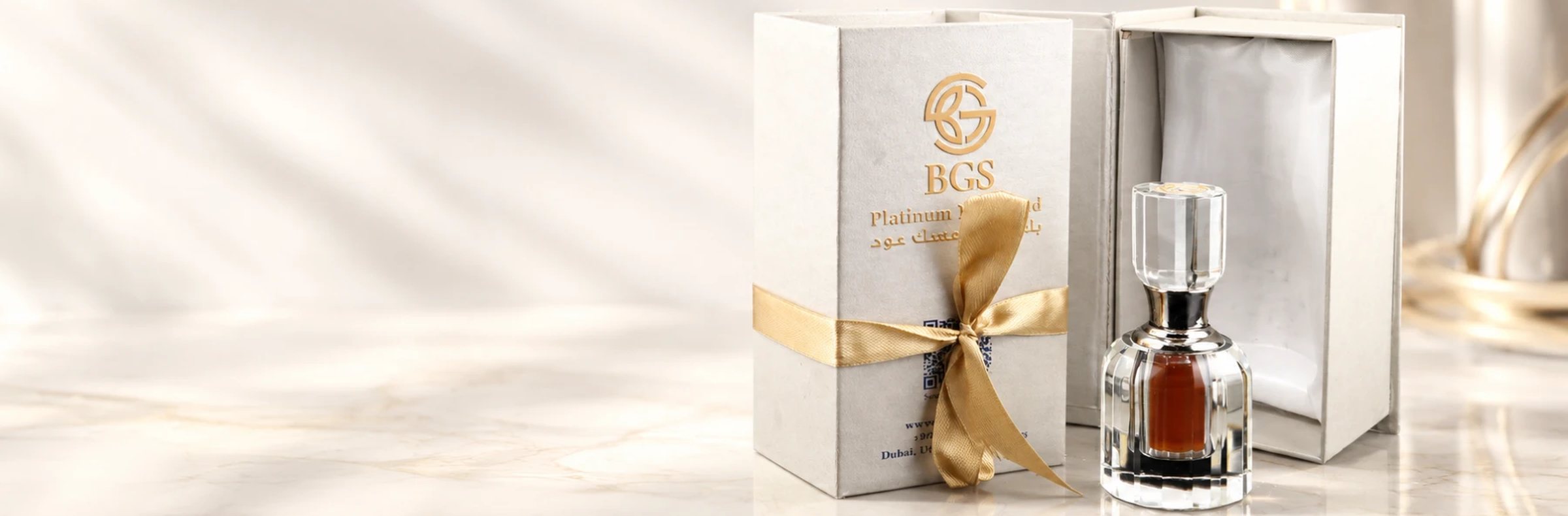 Platinum Musk OUD beside its ribboned box